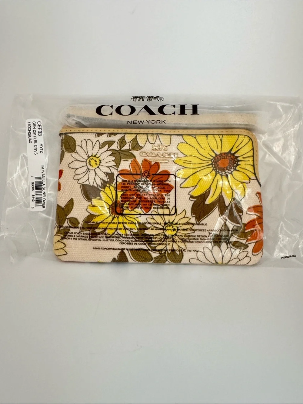 Coach CEF83 Vanilla Sunflower Floral Corner Zip Wristlet Canvas Leather Bag NWT